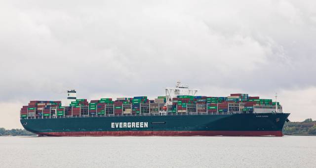 Stade, GErmany - September 25, 2019: Container ship EVER GIVEN, owned by Evergreen Marine Corp. (Taiwan) Ltd., on Elbe river heading to Hamburg